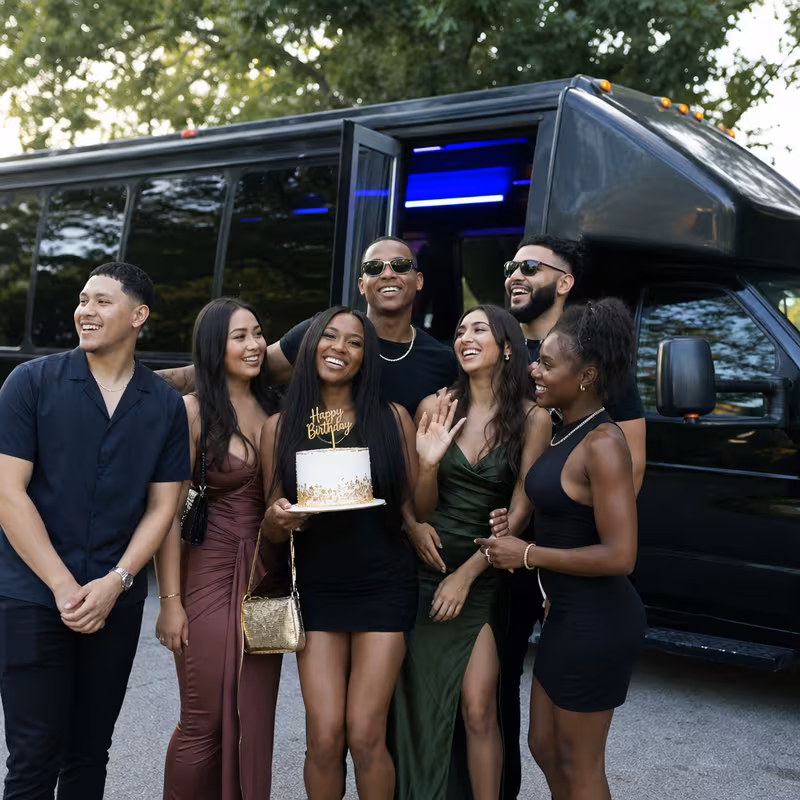 Party bus interior with wraparound leather seating and LED lighting in Davie