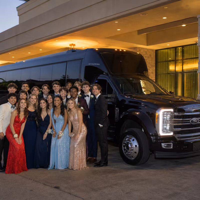 Party bus interior with wraparound leather seating and LED lighting in Davie