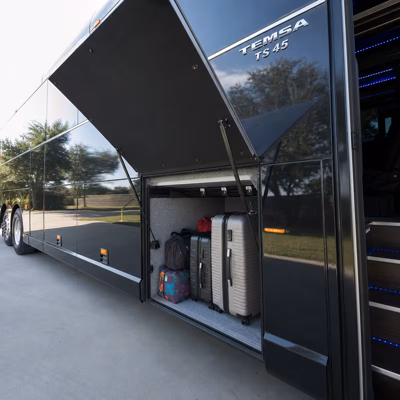 Party bus interior with wraparound leather seating and LED lighting in Davie